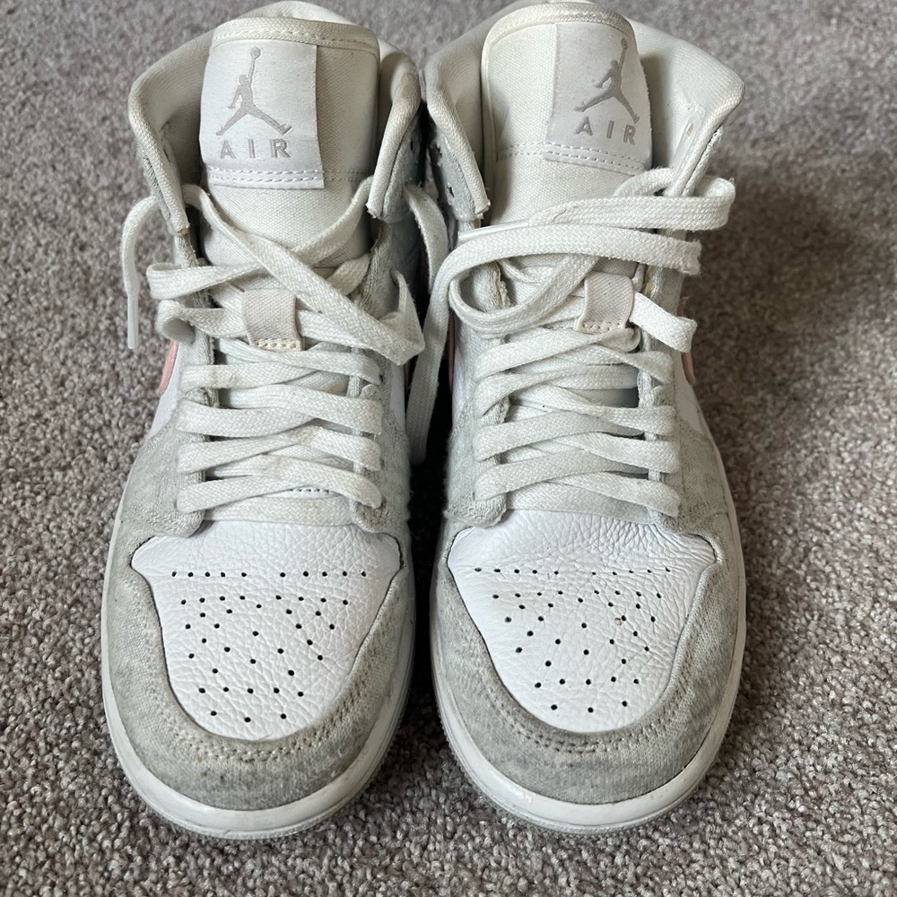 White, gray and pink Jordan 1 mid trainers